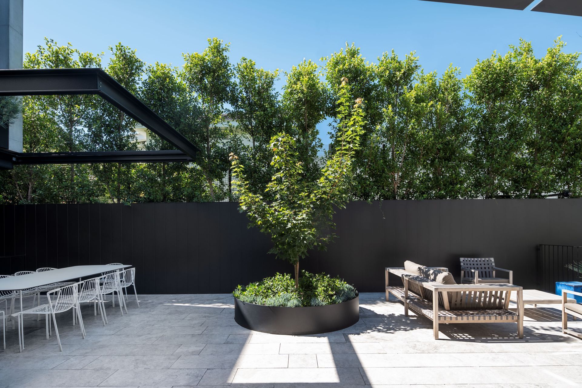 A central courtyard on the mid-level is the perfect spot for entertaining outdoors.