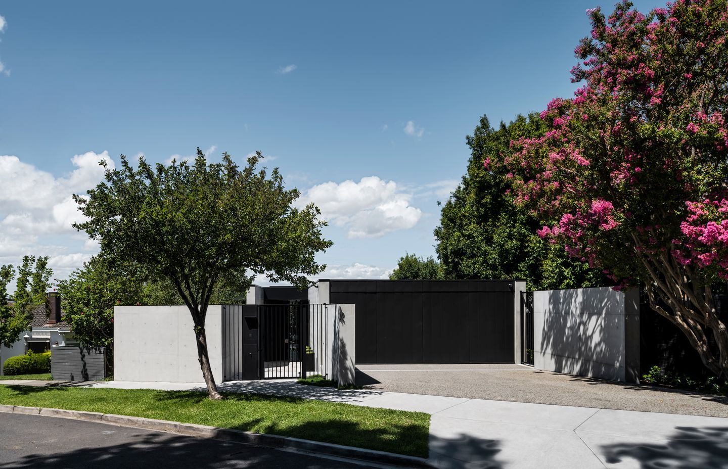 From the street, it reads as a single storey home.