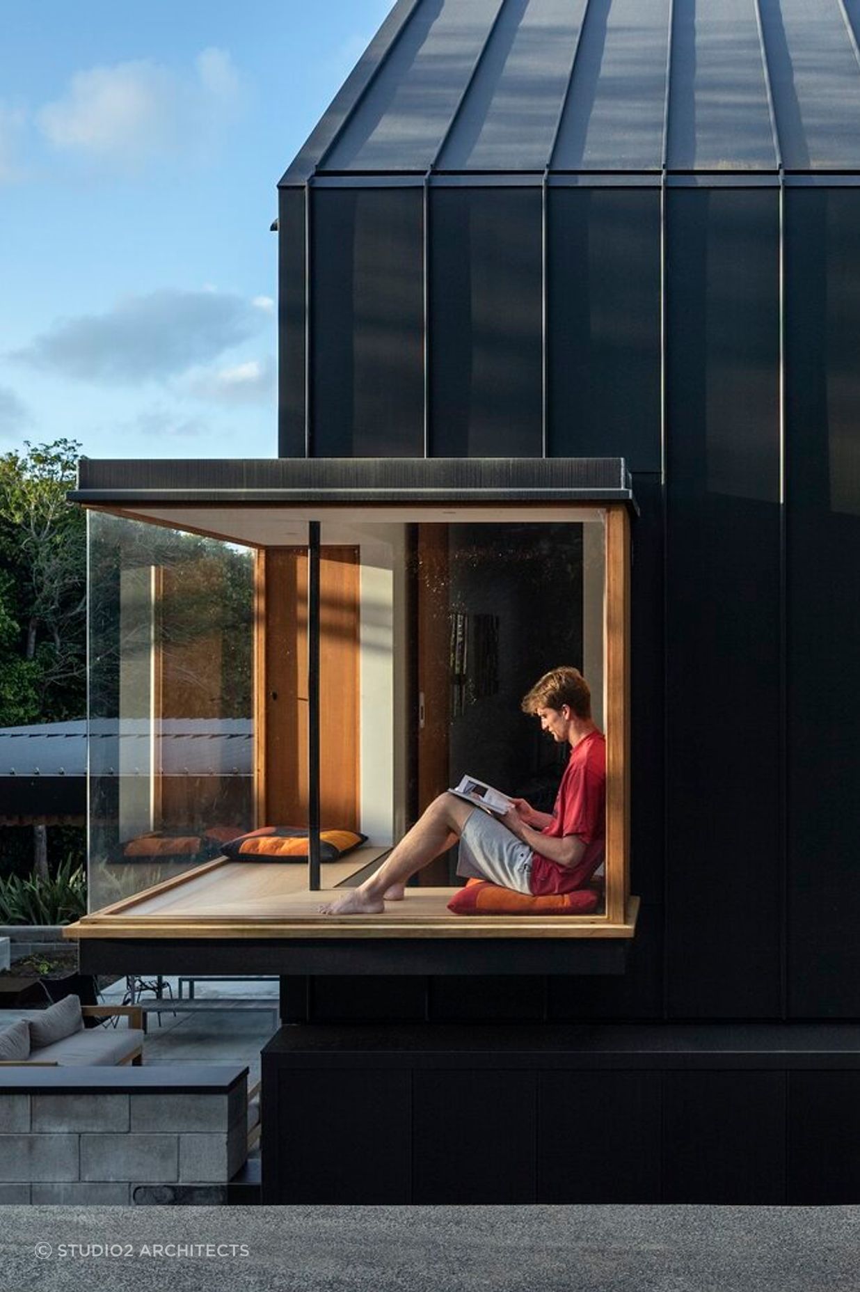 A modern bay window makes a for an incredibly relaxing spot