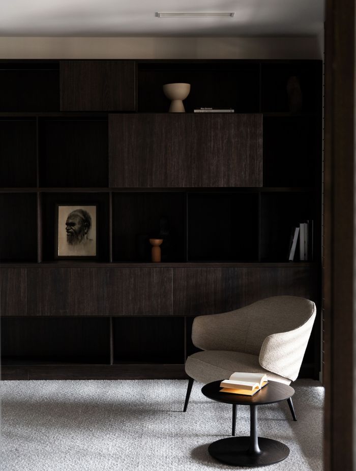 The study, designed with staggering cabinetry with varying depths | Photographer: Anna McLeod