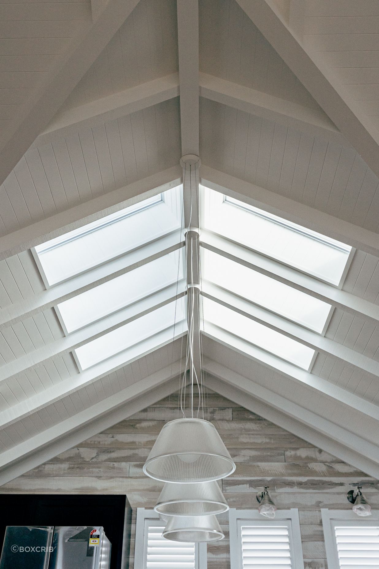 In the interior, the gabled ceilings feature V-groove ply, and sky lights, while the windows feature classic shutters as per the Cape cod style.