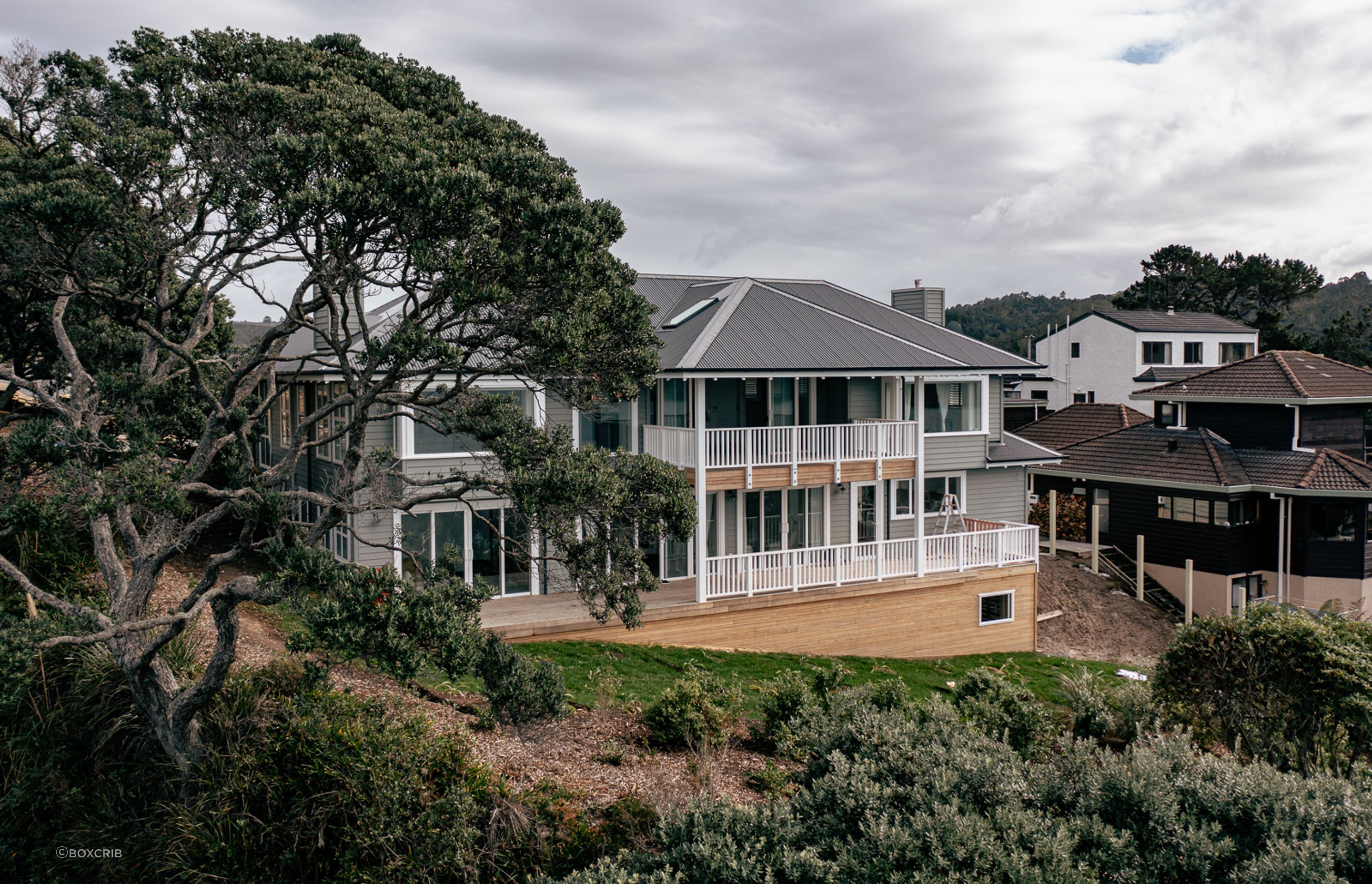 The Cape Cod-style home features a classic symmetry and character detailing.