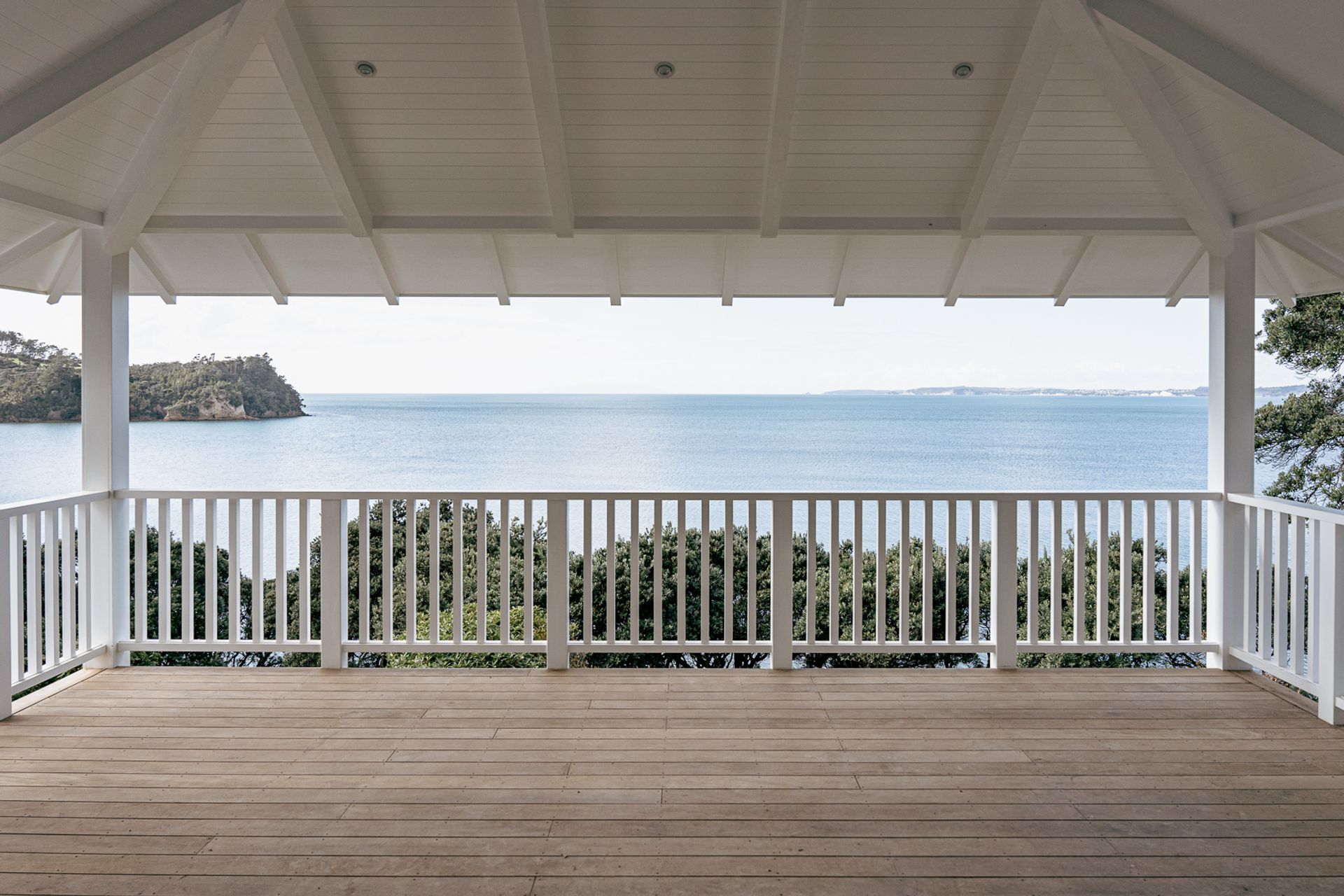 The expansive ocean views are perfectly framed by the upstairs outdoor living space.