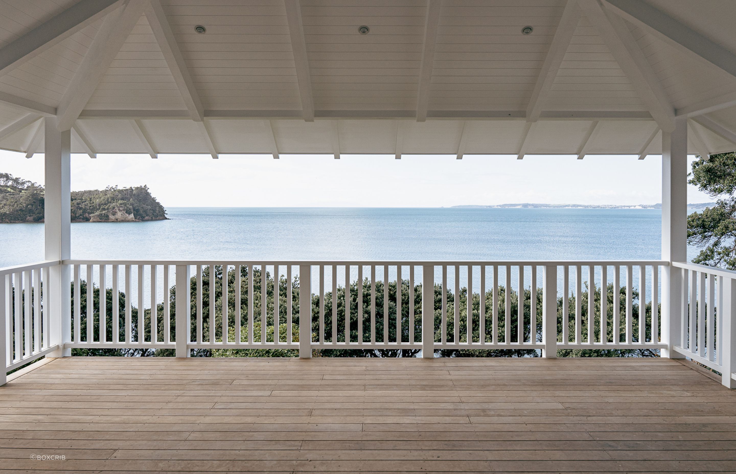 The expansive ocean views are perfectly framed by the upstairs outdoor living space.
