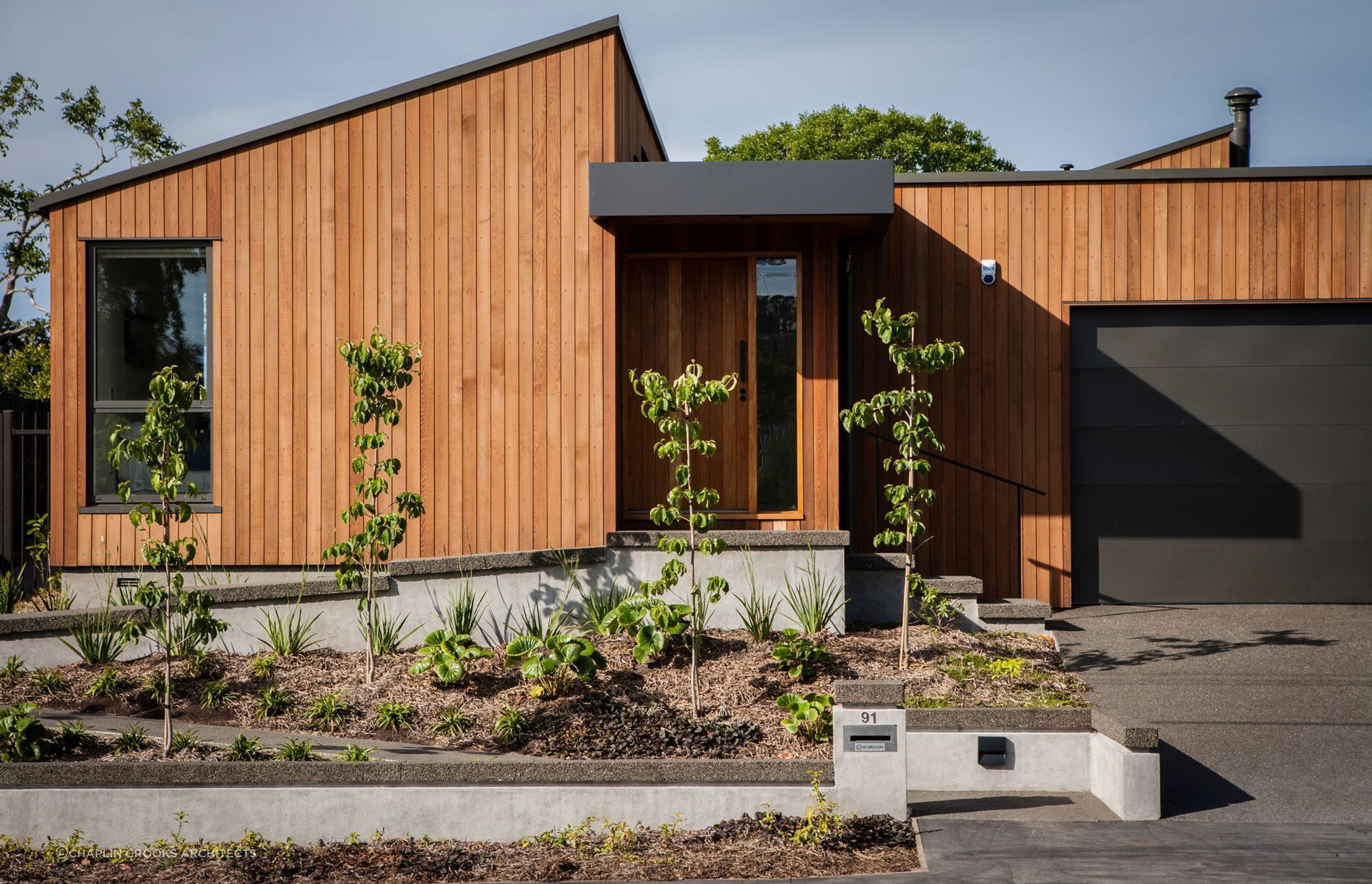 Beautiful vertical cedar weatherboards take centre stage at Opawa House.