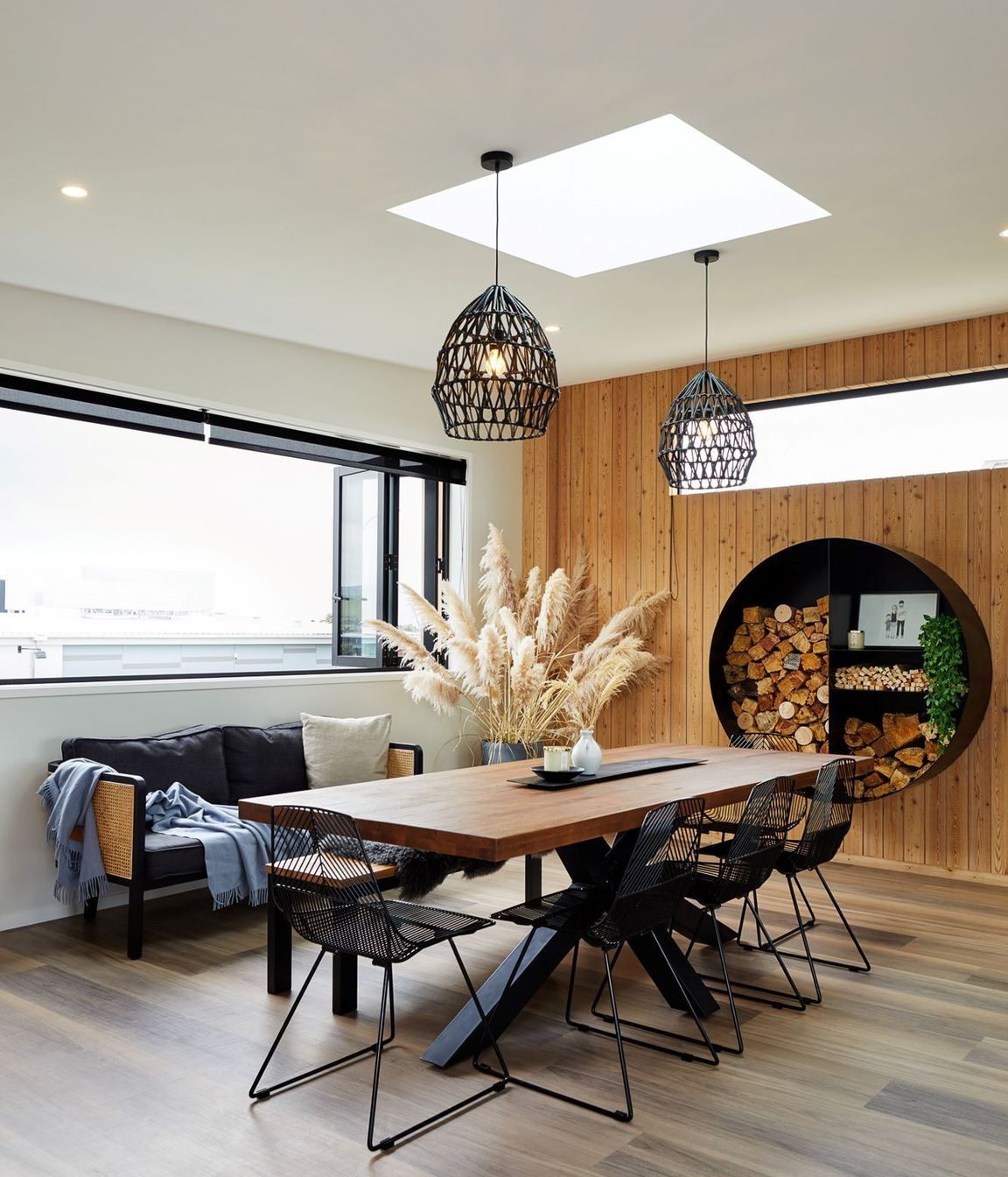 The home's interior timber wall panelling matches the exterior cladding for a cohesive look. | Photography: Amanda Aitken
