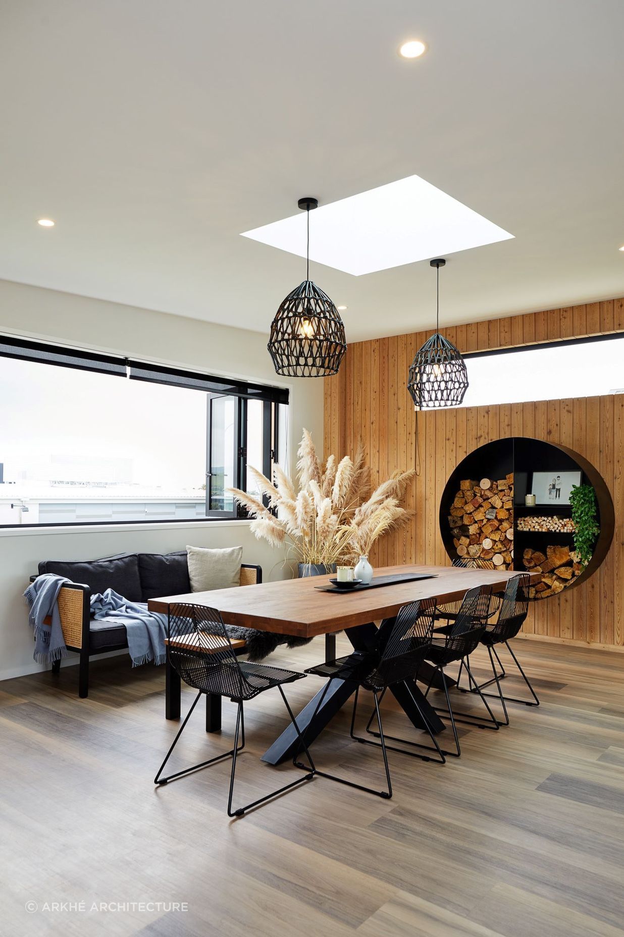 The home's interior timber wall panelling matches the exterior cladding for a cohesive look. | Photography: Amanda Aitken