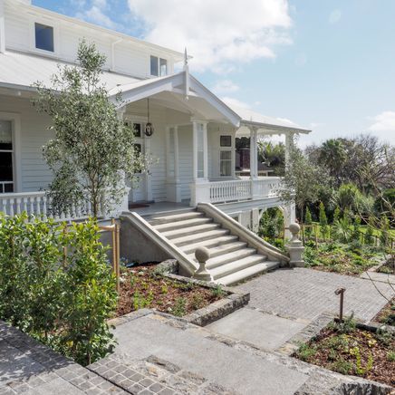 A historic Parnell home and the landscaping matching its grandeur