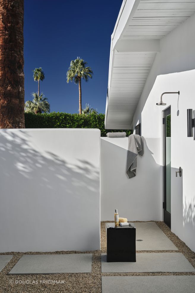 Lewis balances pavers that resist heat buildup underfoot against ones pale enough to avoid glare during the brightest hours.