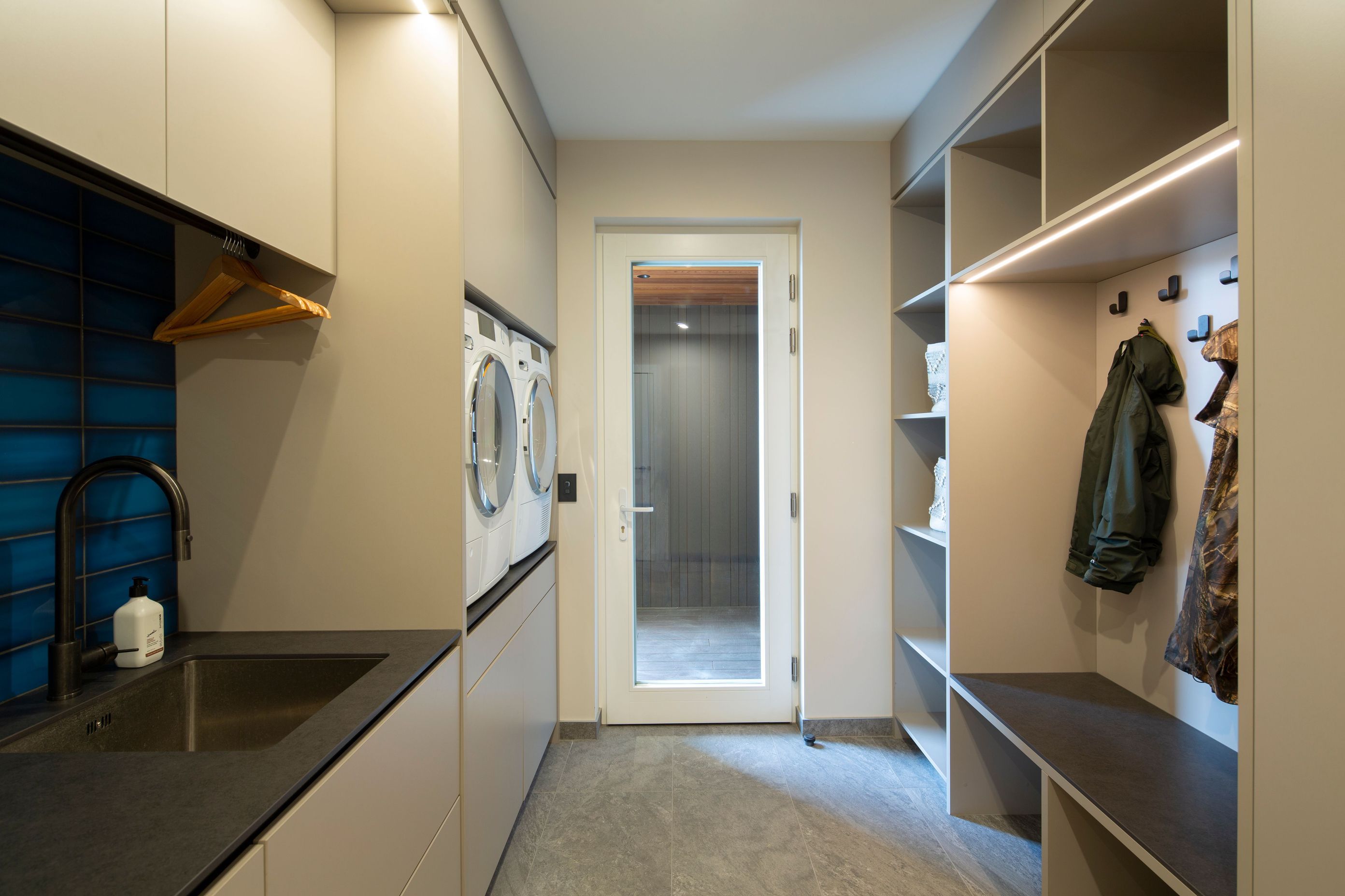 The perfectly appointed laundry and mudroom is the perfect entrance after a day of skiing.