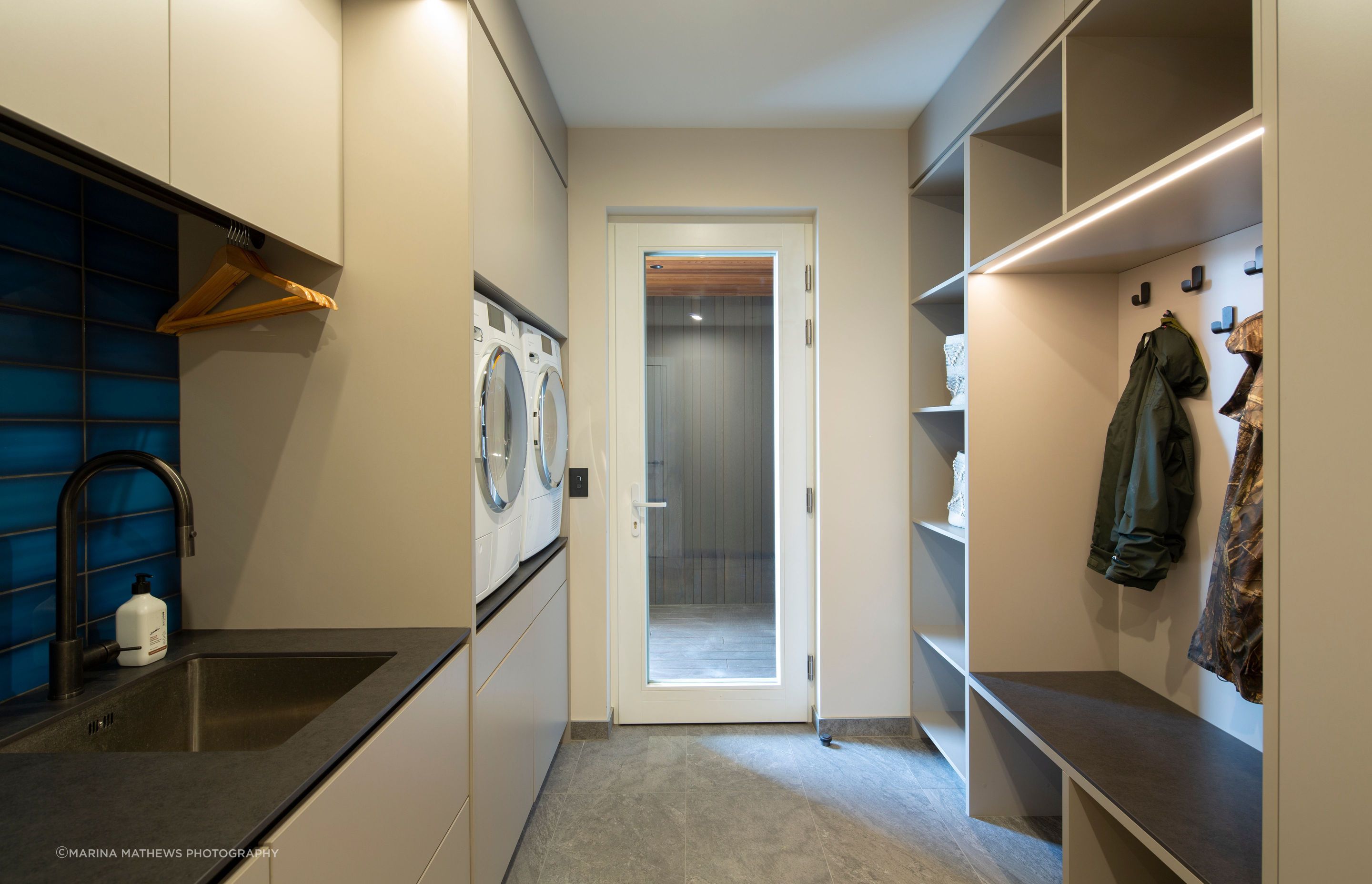 The perfectly appointed laundry and mudroom is the perfect entrance after a day of skiing.