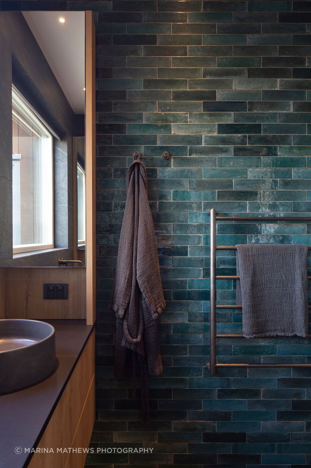 The master bedroom showcases tiles in the same colours of the river bed.