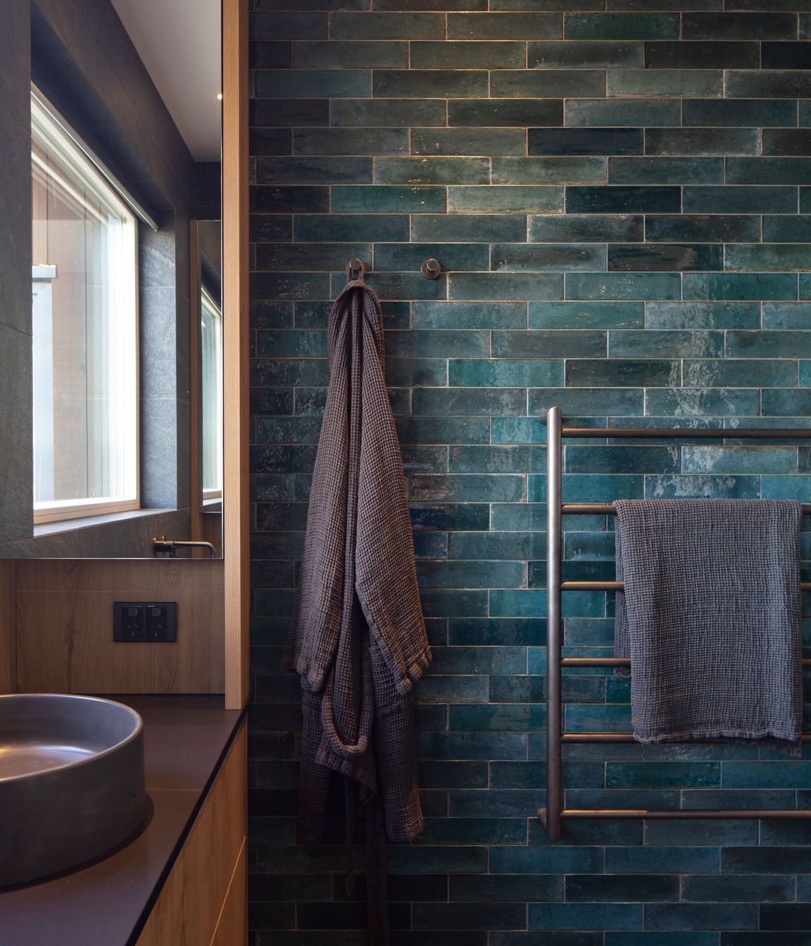 The master bedroom showcases tiles in the same colours of the river bed.