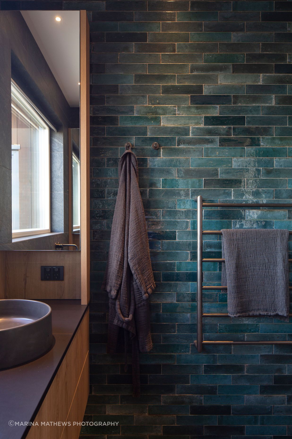 The master bedroom showcases tiles in the same colours of the river bed.