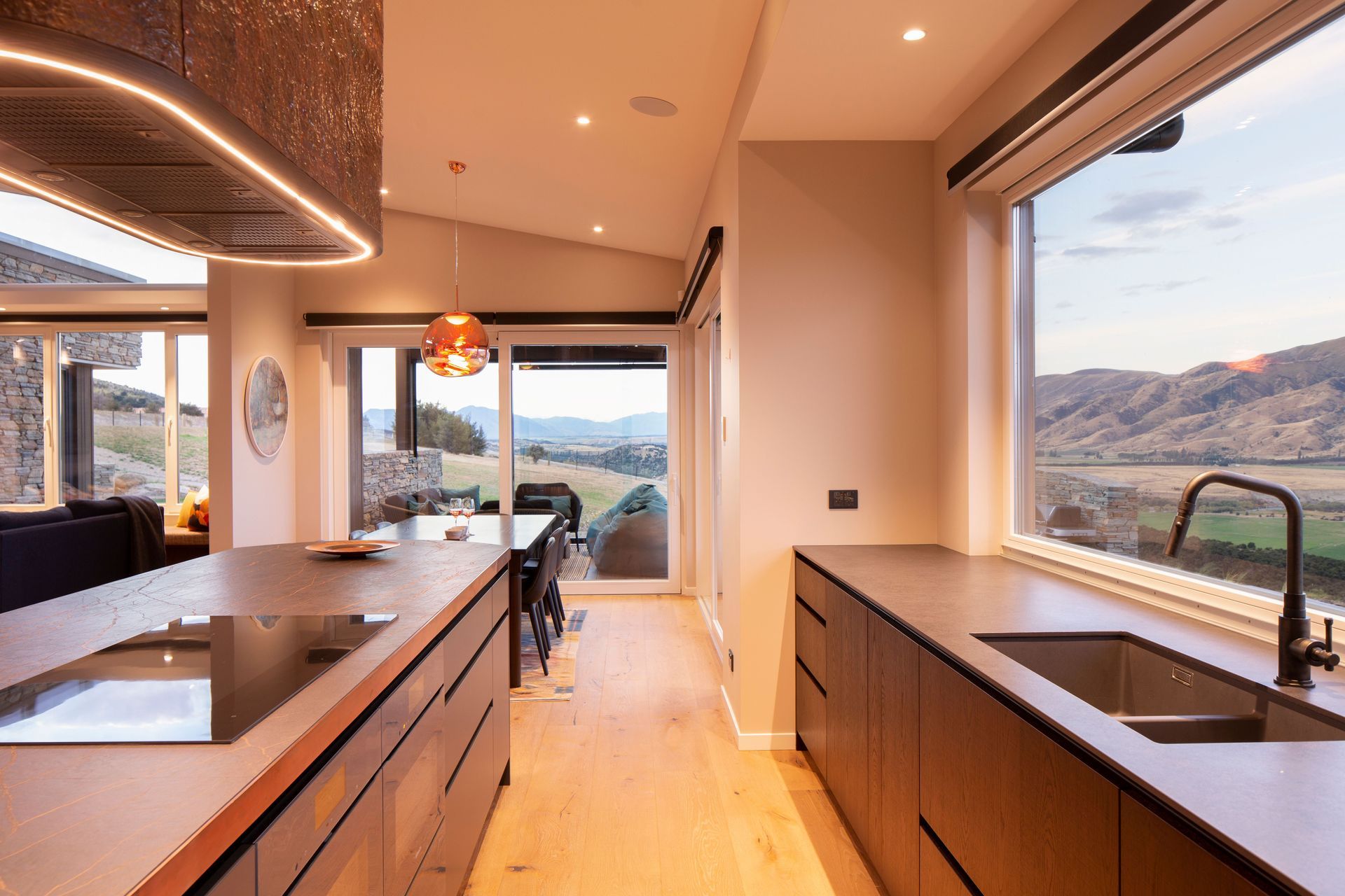 The open-plan nature of the layout connects the living spaces with the views.