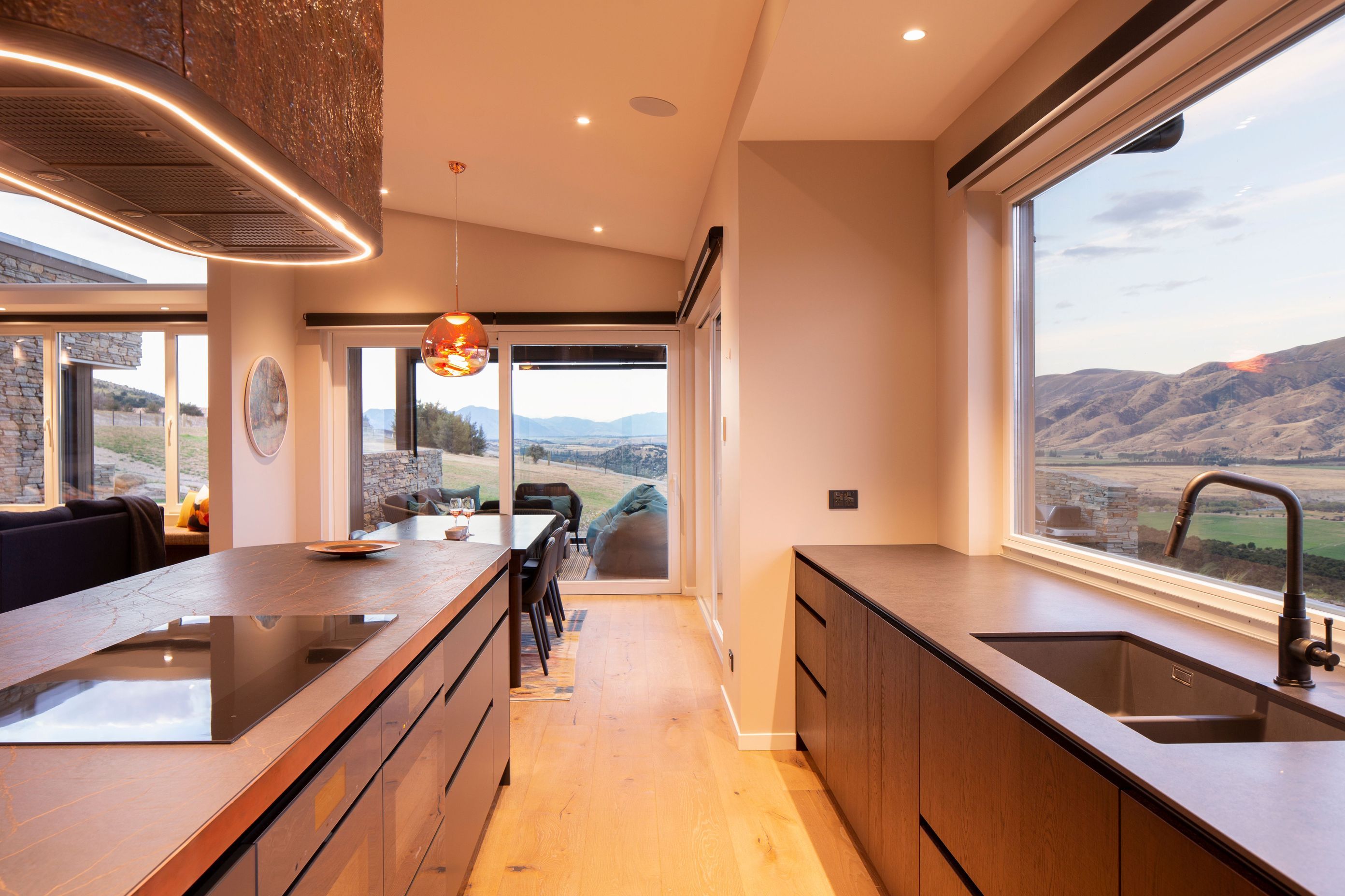 The open-plan nature of the layout connects the living spaces with the views.