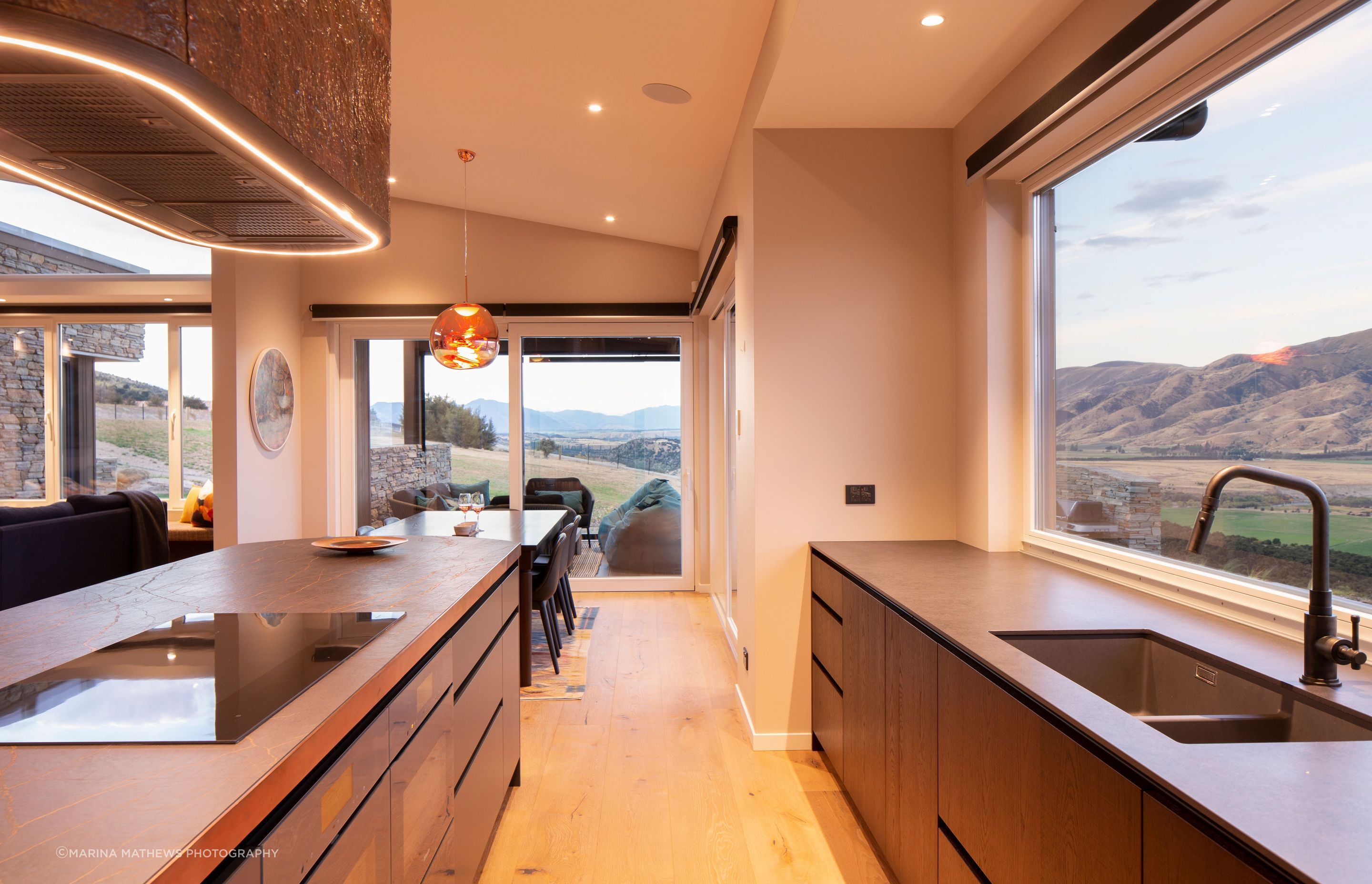 The open-plan nature of the layout connects the living spaces with the views.
