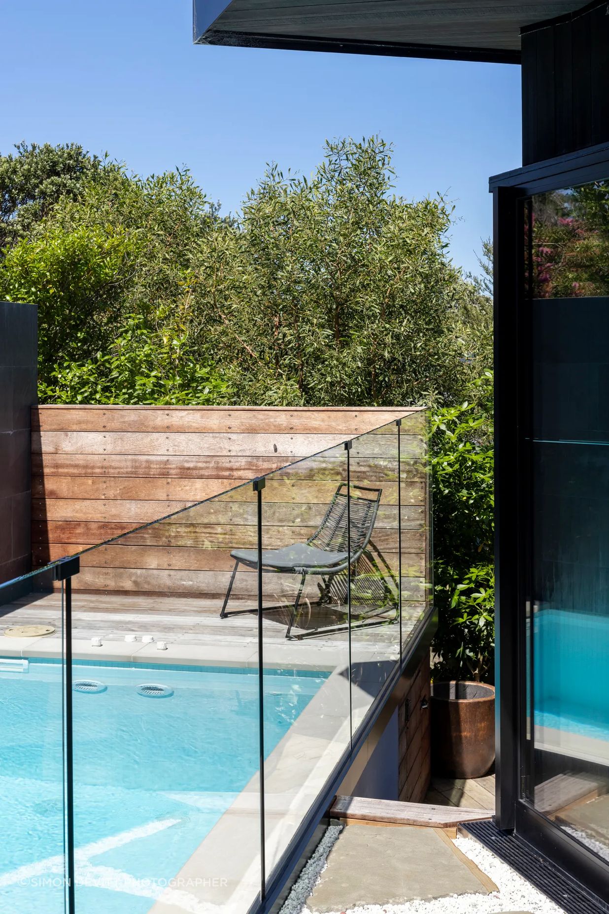 The swimming pool — a sort of bookend to the living room.  Described by Jonathan as the home's 'little blue jewel'.