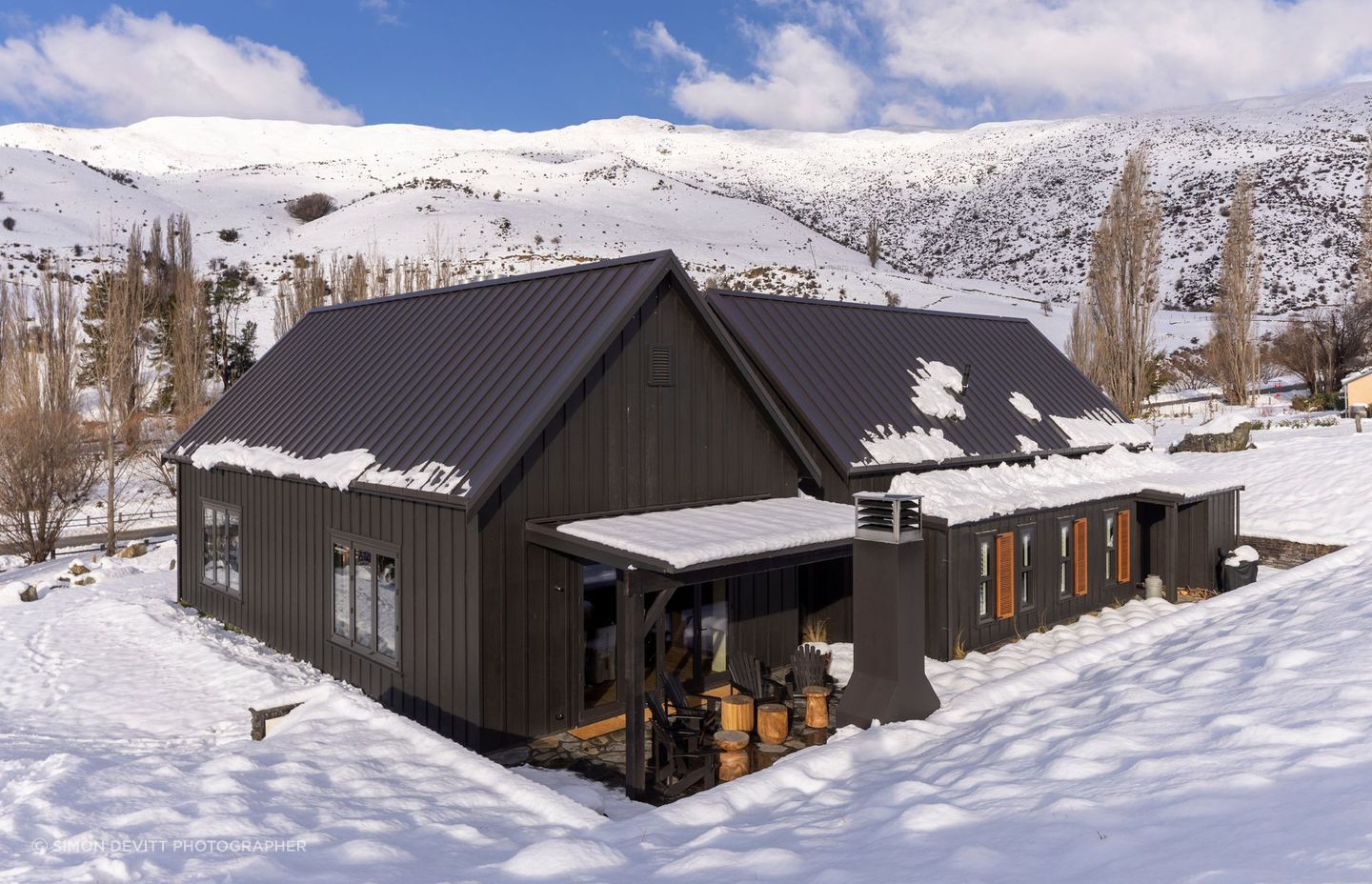 The back of the house. Both barn forms are identical in size and shape.
