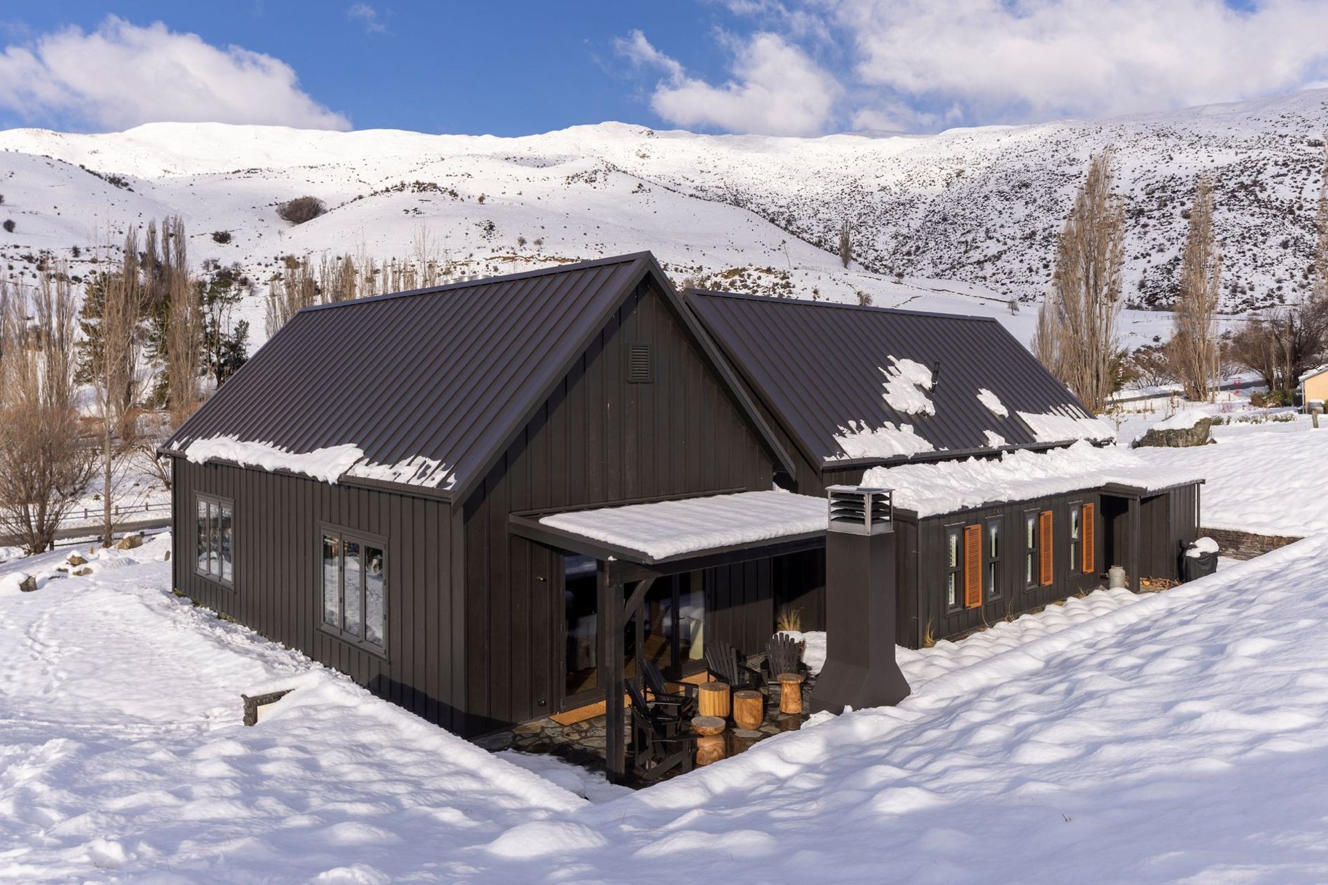 The back of the house. Both barn forms are identical in size and shape.