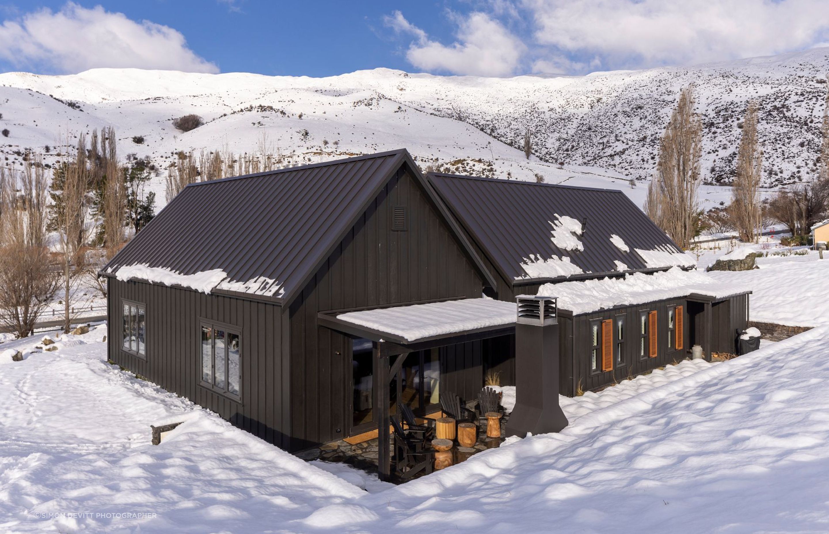 The back of the house. Both barn forms are identical in size and shape.