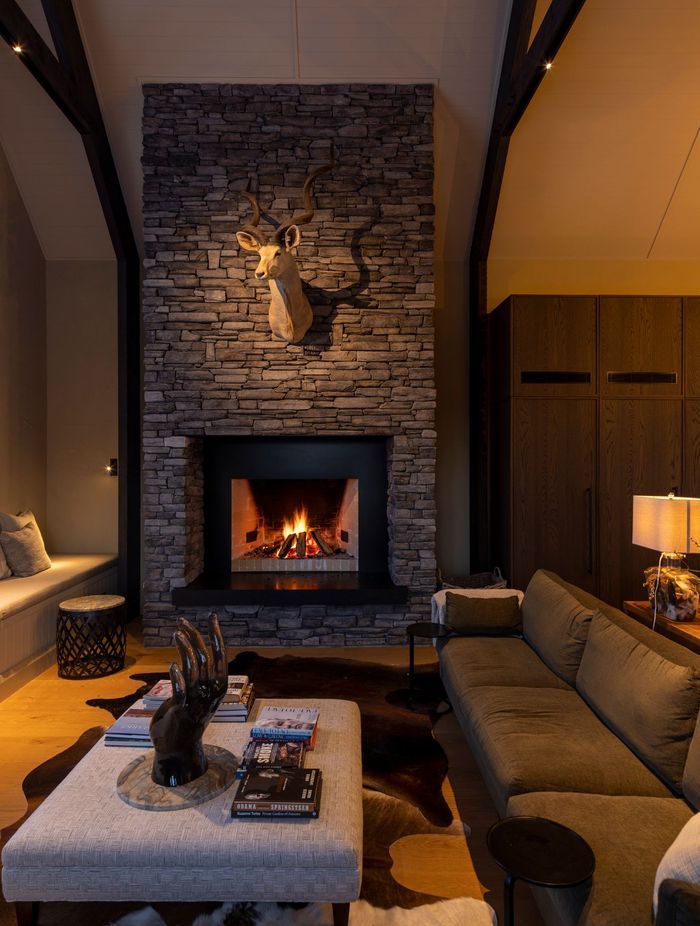 The lounge area. “All of the fabrics have a lot of texture and a very restrained palette in terms of olives and taupes,” says Vee.