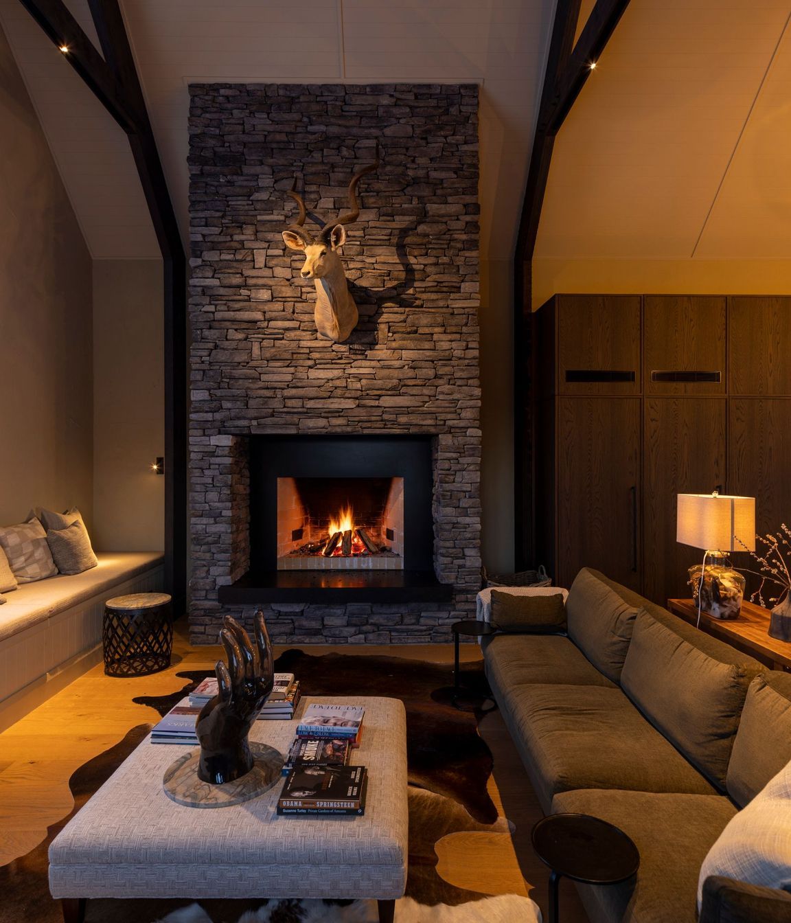 The lounge area. “All of the fabrics have a lot of texture and a very restrained palette in terms of olives and taupes,” says Vee.
