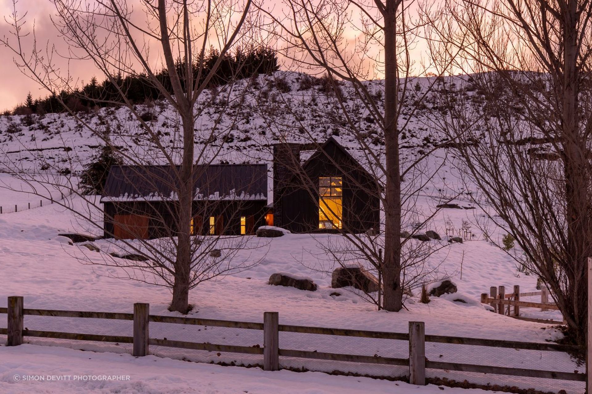 Interior designer Vee Kessner of Space Studio says that this rustic-looking holiday home in Cardrona Valley has hidden high-tech functionality. “While the owners wanted it to be very much a barn feel, they were conscious that it still needed to operate easily.”