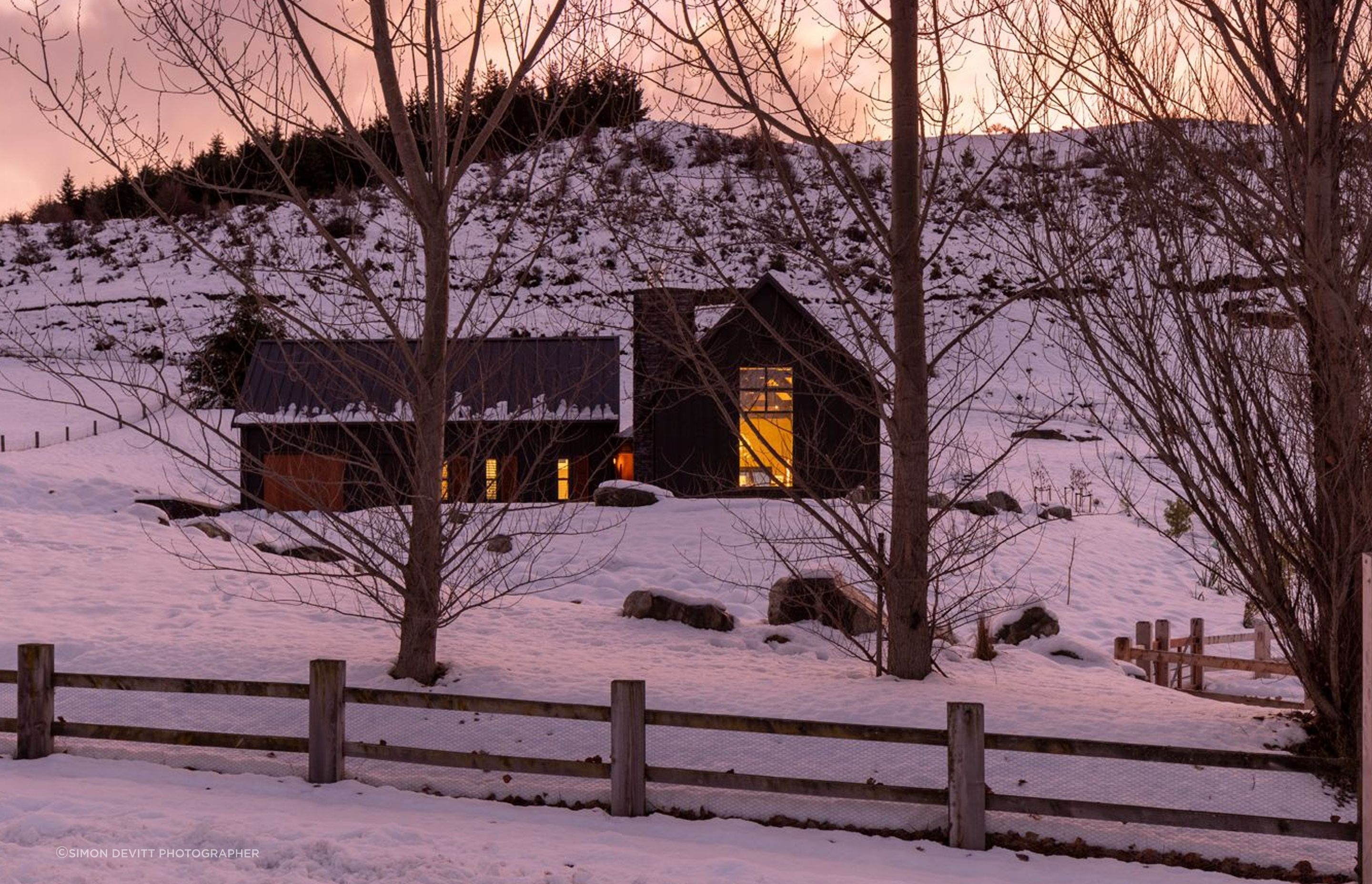 Interior designer Vee Kessner of Space Studio says that this rustic-looking holiday home in Cardrona Valley has hidden high-tech functionality. “While the owners wanted it to be very much a barn feel, they were conscious that it still needed to operate easily.”