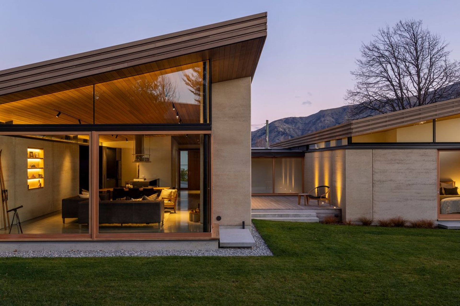The north face of Winding Roof House, where you can most clearly see the single-corner elevation of the two roofs. | Photographer: Simon Devitt