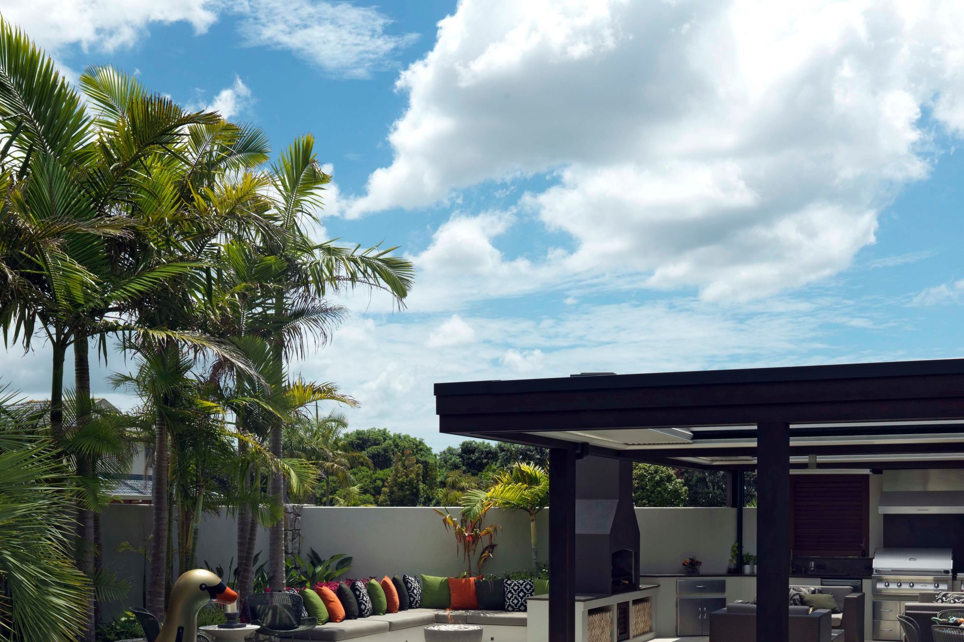 In the entertainment zone, a row of seating centred around a fire pit anticipates a family evening.