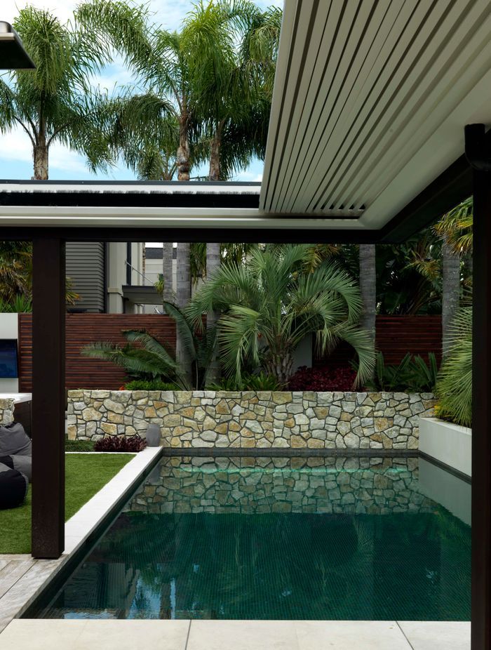 Te Kuiti limestone from Island Stone was chosen and two Johnson and Couzins concertina louvre roofs were installed to offer the option of shade.