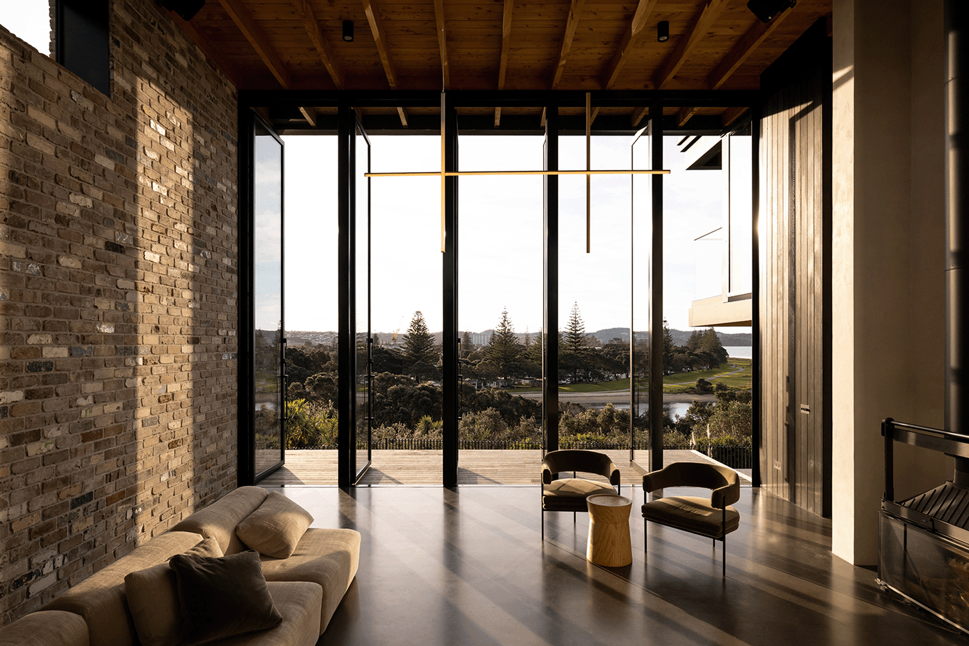 Beautiful recycled bricks feature inside and out of the exquisite Red Beach House — Photography: Jono Parker