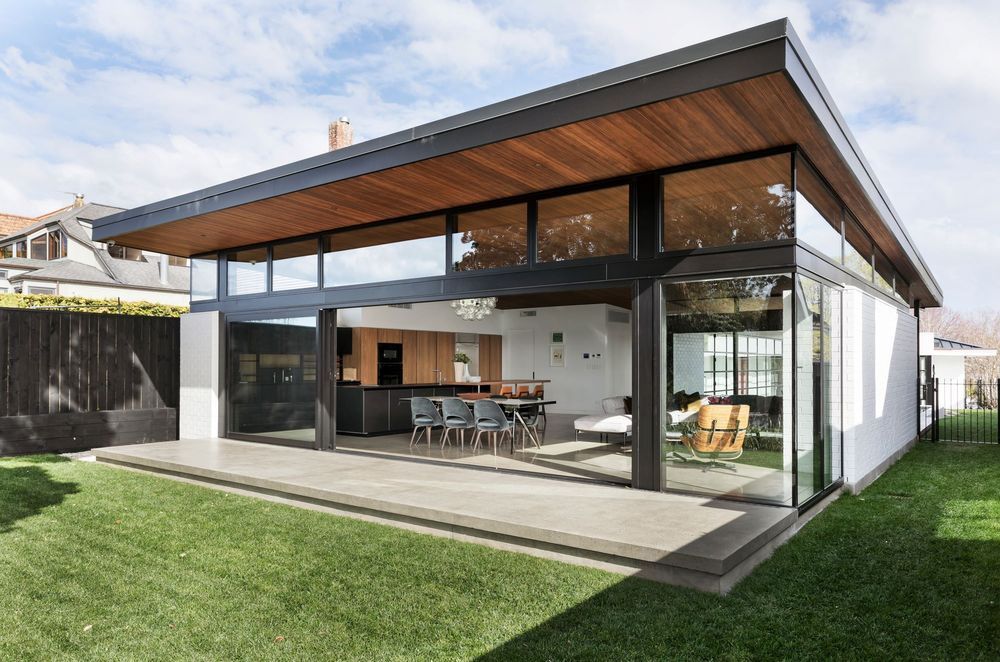 A sophisticated blend of history and luxury personifies this Remuera House featuring stepped brickwork.