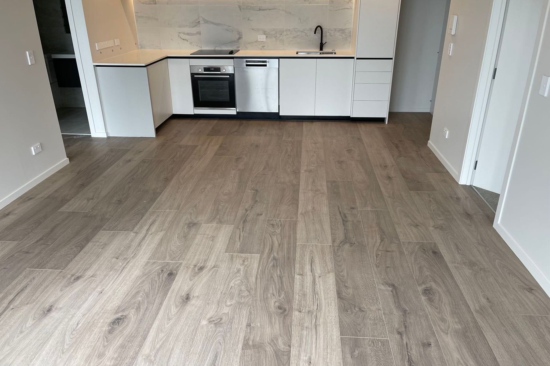 The floor’s subtle, natural colour complements the neutral palette of the Risland units, making it easy for residents to add their own flair to the space.
