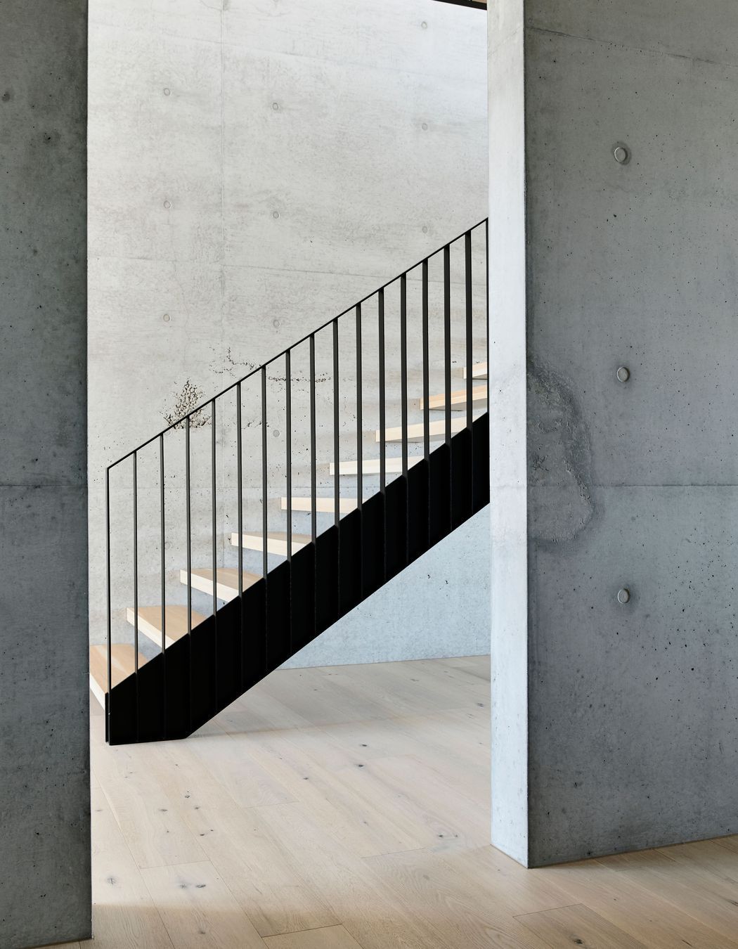 The stairwell lets light into the bottom floor.