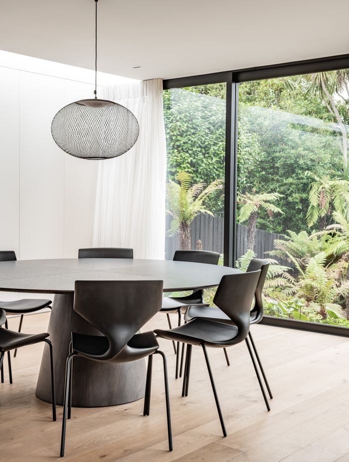 The dining area connects to the outdoors with a view to the stream at the bottom of the garden. “The key motivator is all about filling the house with light, because it hasn't got that direct northern orientation.”