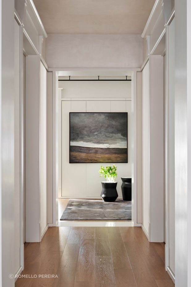 Oak floorboards create continuity throughout.