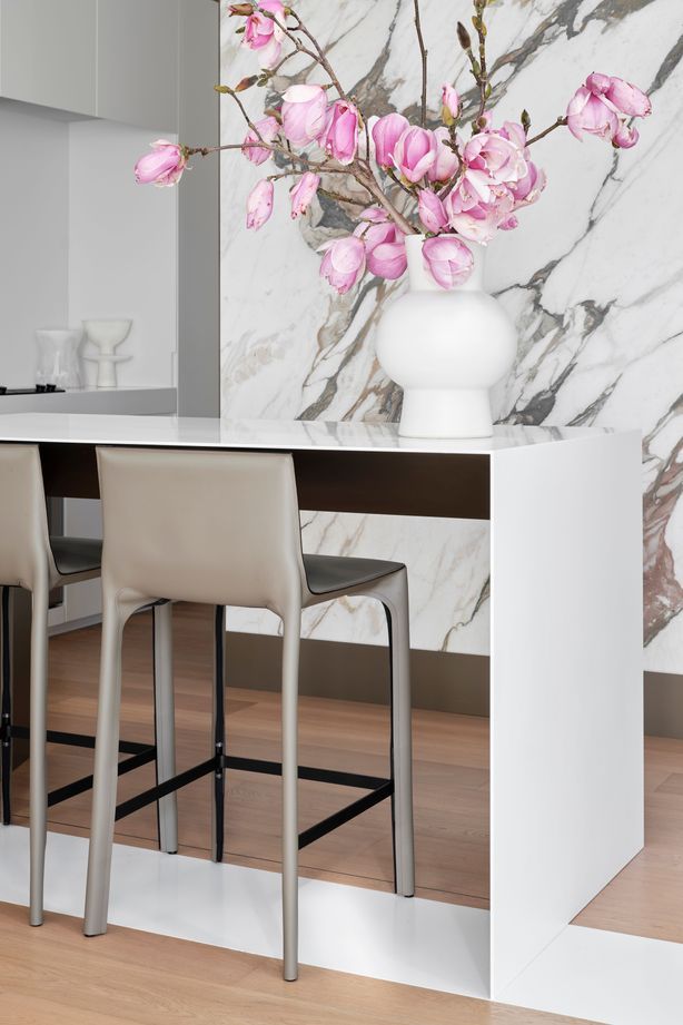 The kitchen bar is cleverly designed to hide its storage.