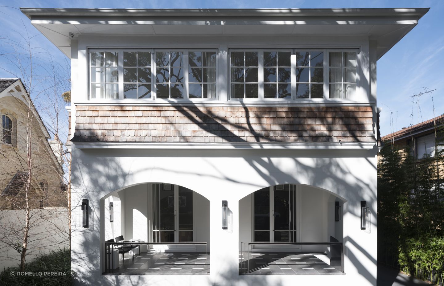 The original Arts &amp; Crafts exterior and enclosed veranda were retained.