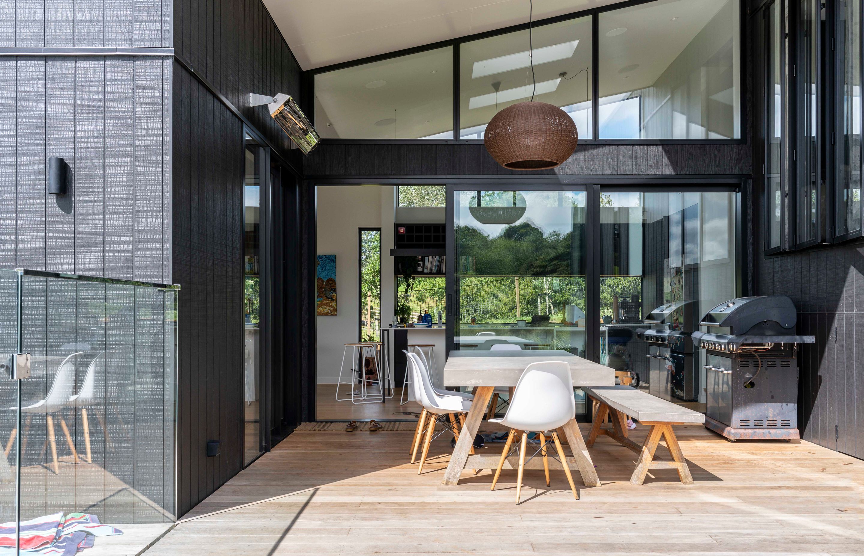 The floor to ceiling joinery floods the living spaces with light and creates perfect indoor/outdoor flow to the covered outdoor deck.