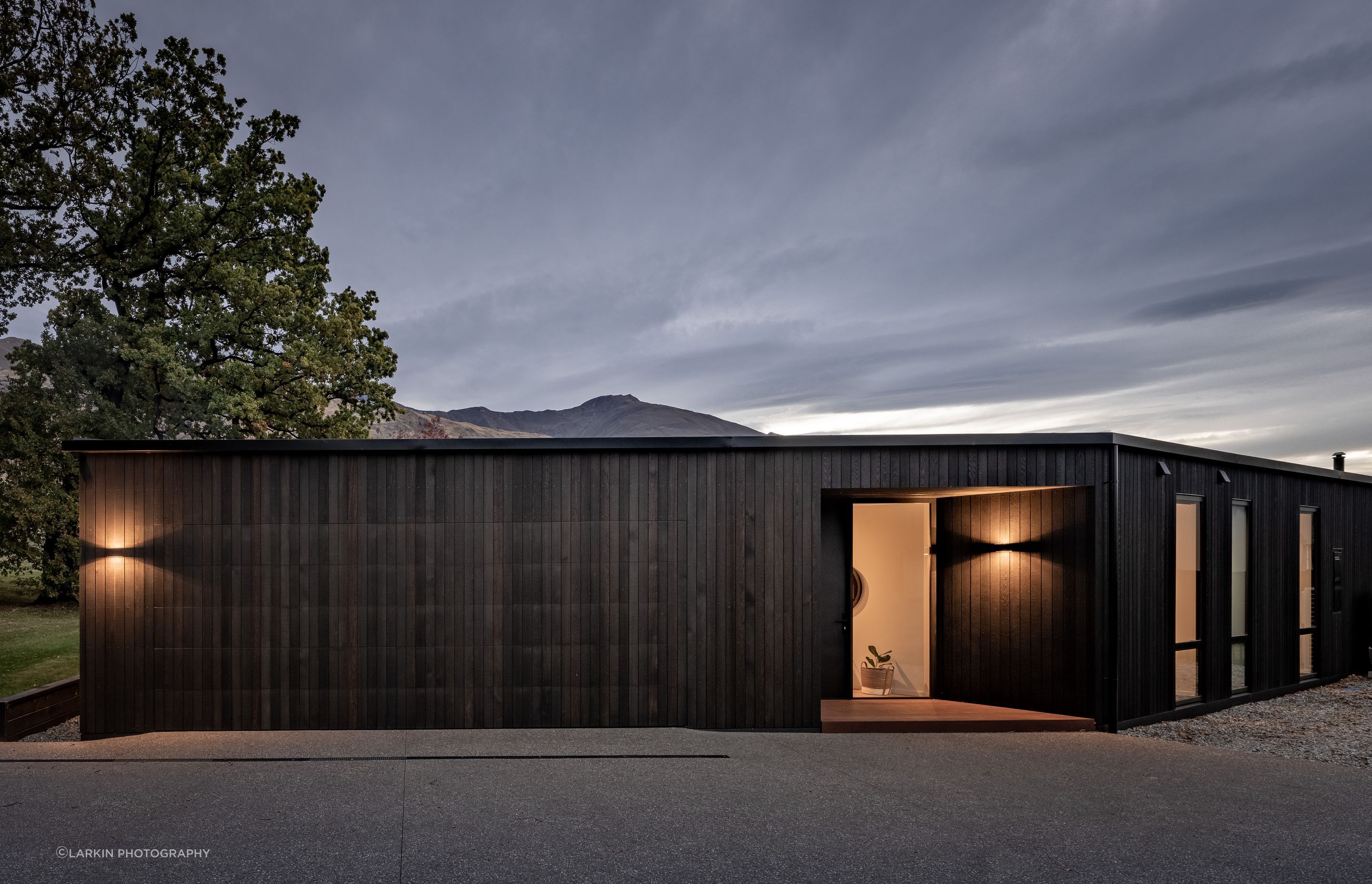 The sleek holiday home in Wanaka designed by Warwick McLaren of McLaren Architecture.Design presents a simple facade. “The built form isn’t too tricky. The house was definitely done cost-effectively but in the end this doesn’t limit it.”
