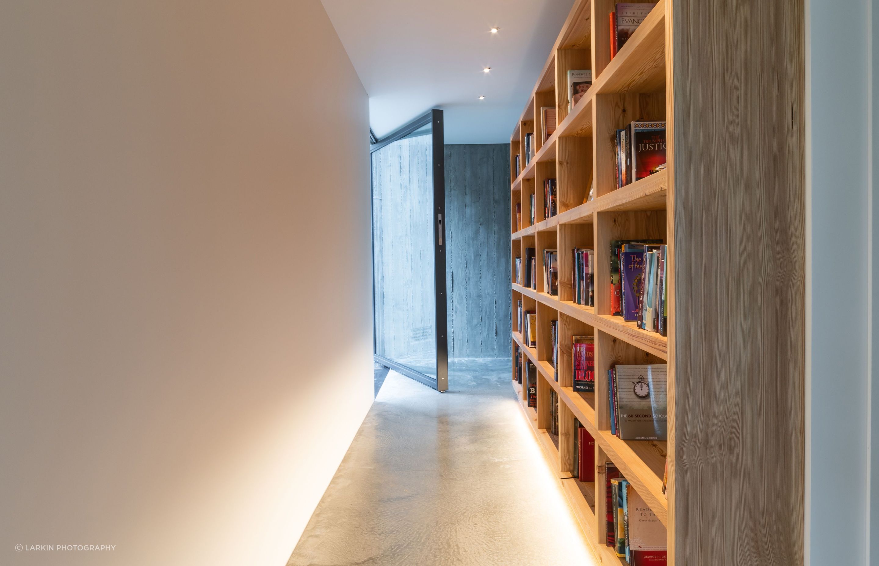 A gallery-style corridor leads through the second and third bedrooms.