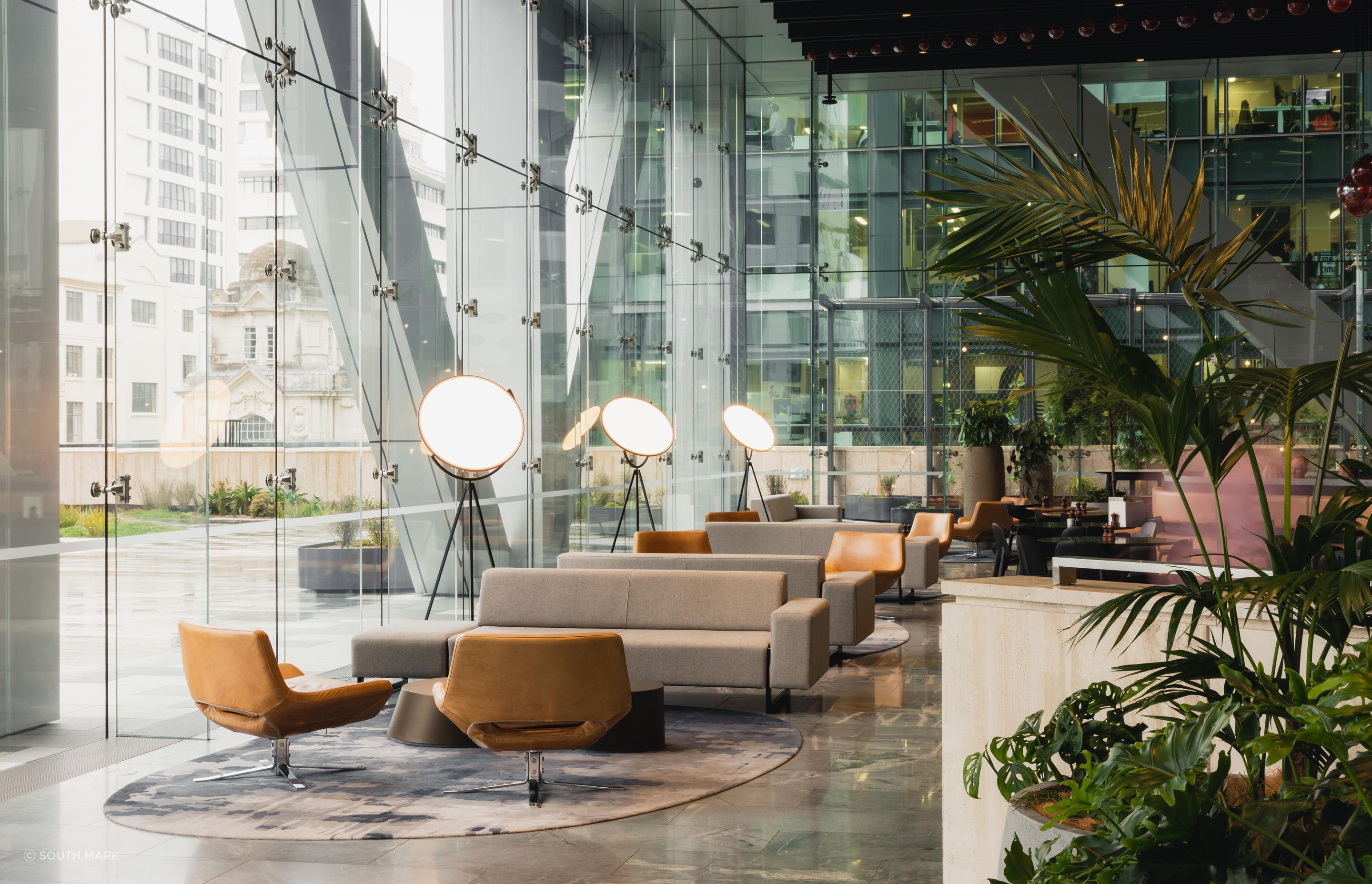 Materials are both soft and hard-wearing, with inviting fabric sofas and leather accent chairs.