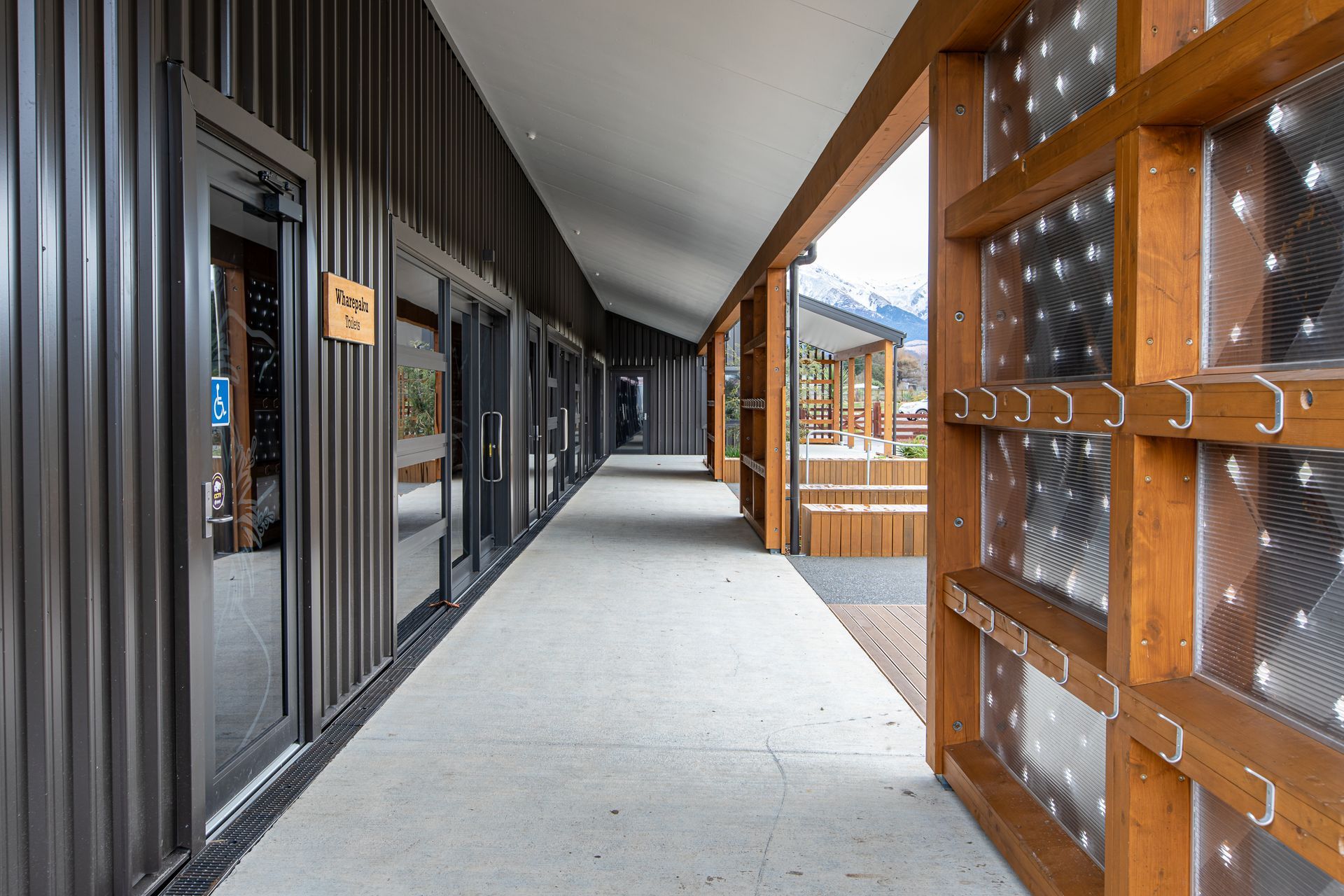 The internal side of the rain screens serves a bag and sheltered area for the students.
