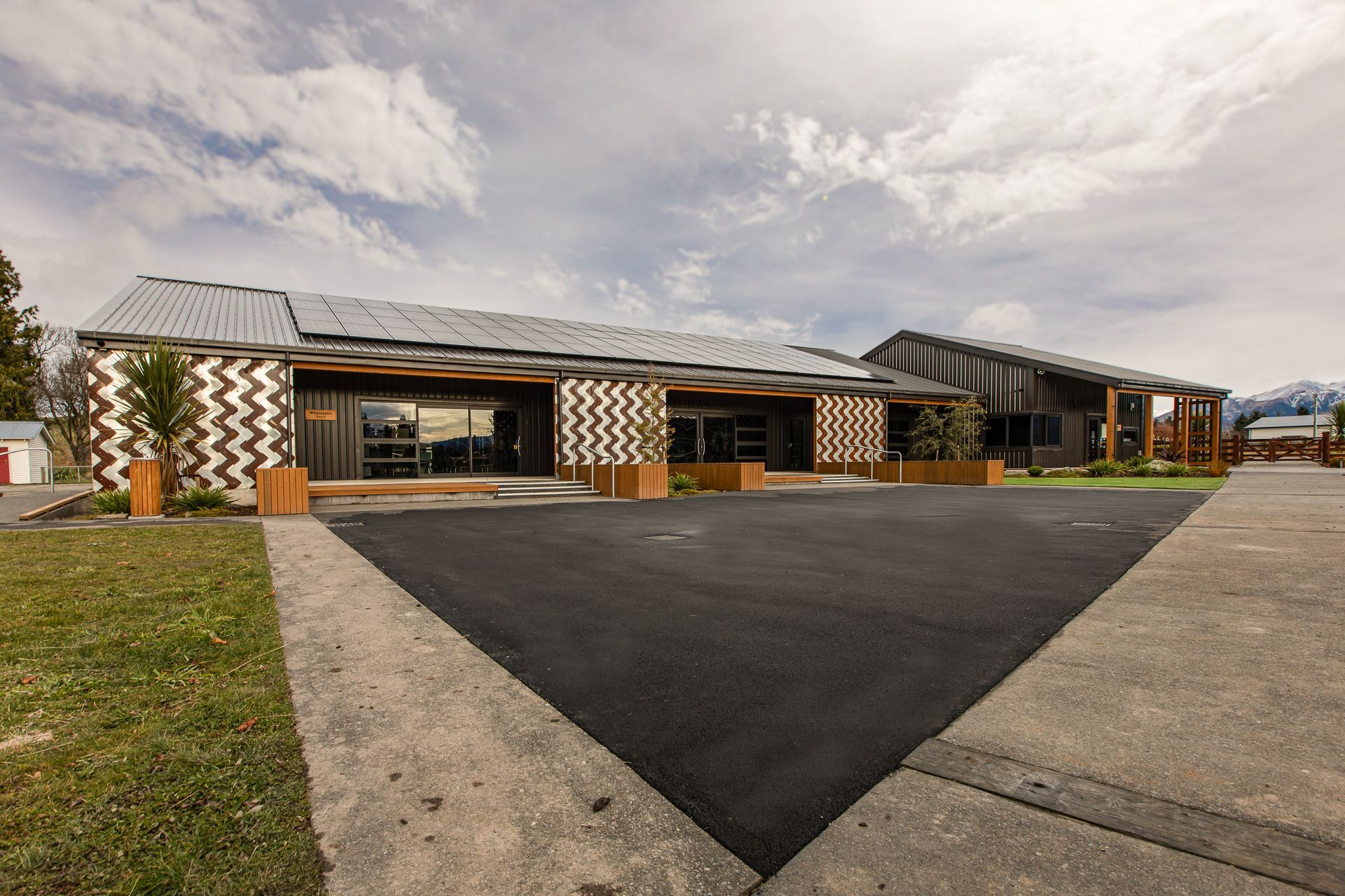 The new classroom block on the left and the administration building on the right.