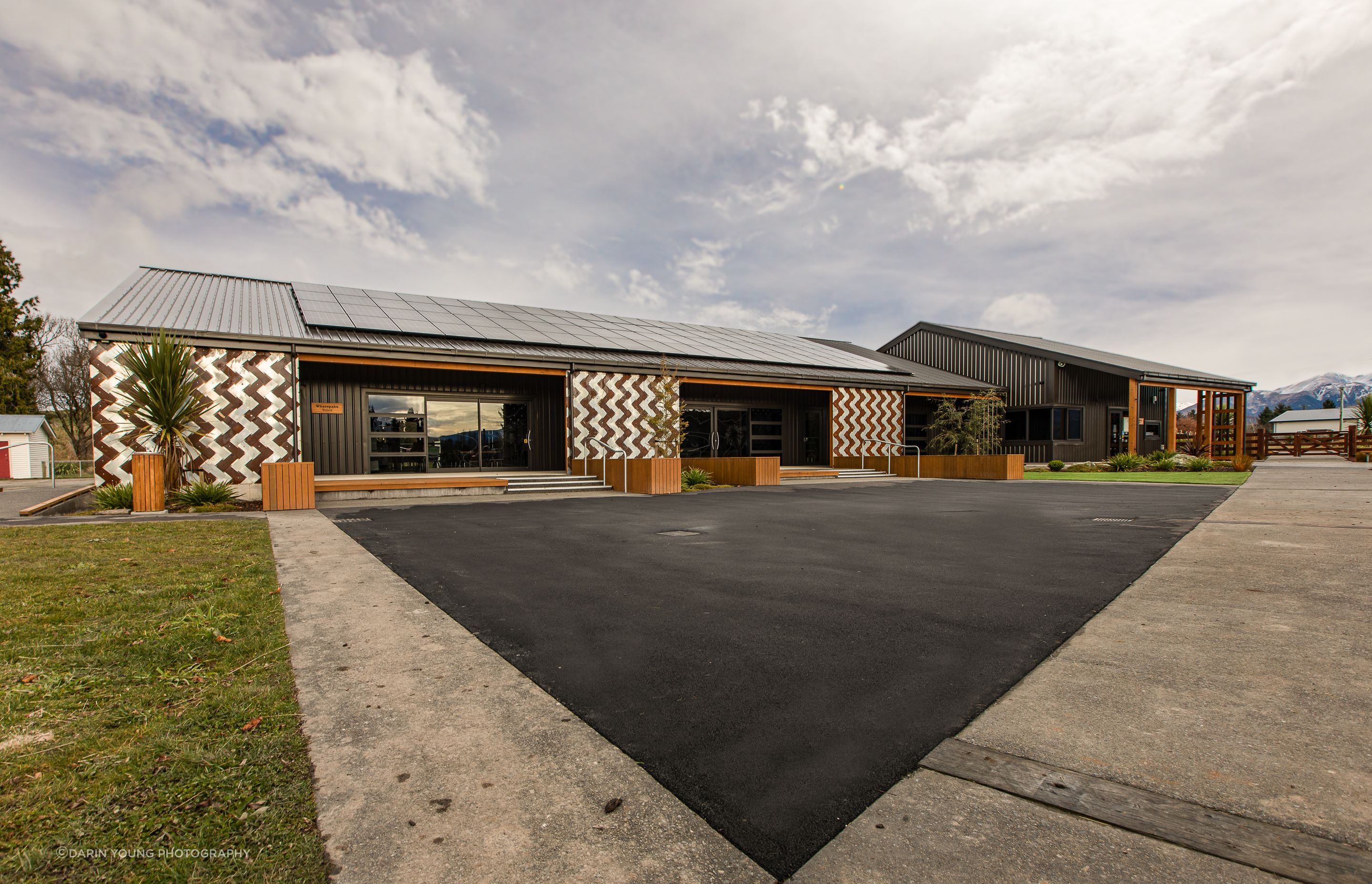 The new classroom block on the left and the administration building on the right.