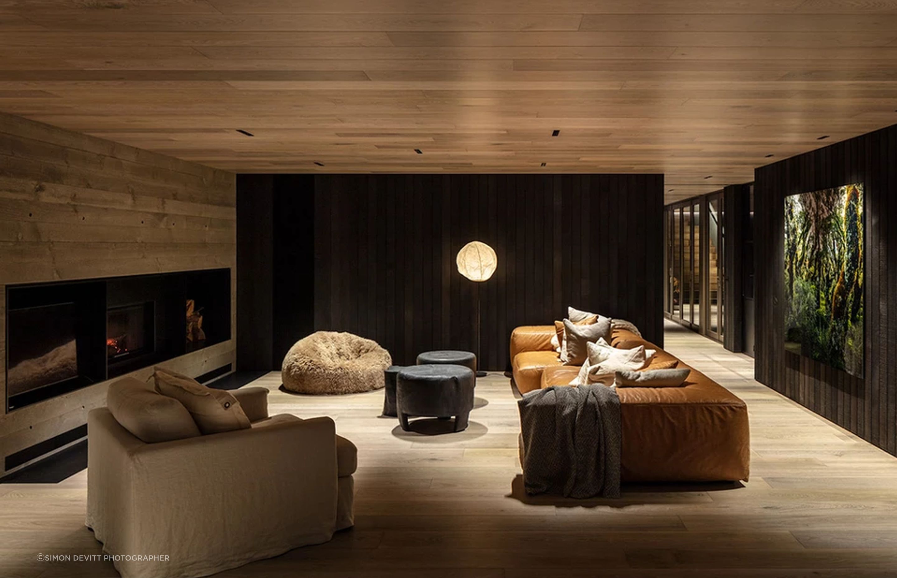 The living area floors and ceilings are by Forté Flooring. Fiona designed the sofa and it had it made, and the bean bag is Wilson & Dorset.