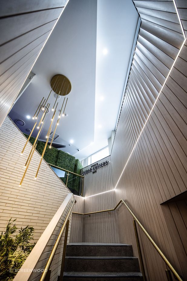 Screenwood PANELS rangge in Flute line the stairwell.