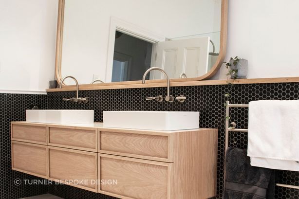 Black honeycombed shapped tiles line the walls | Photos by Jennifer Turner